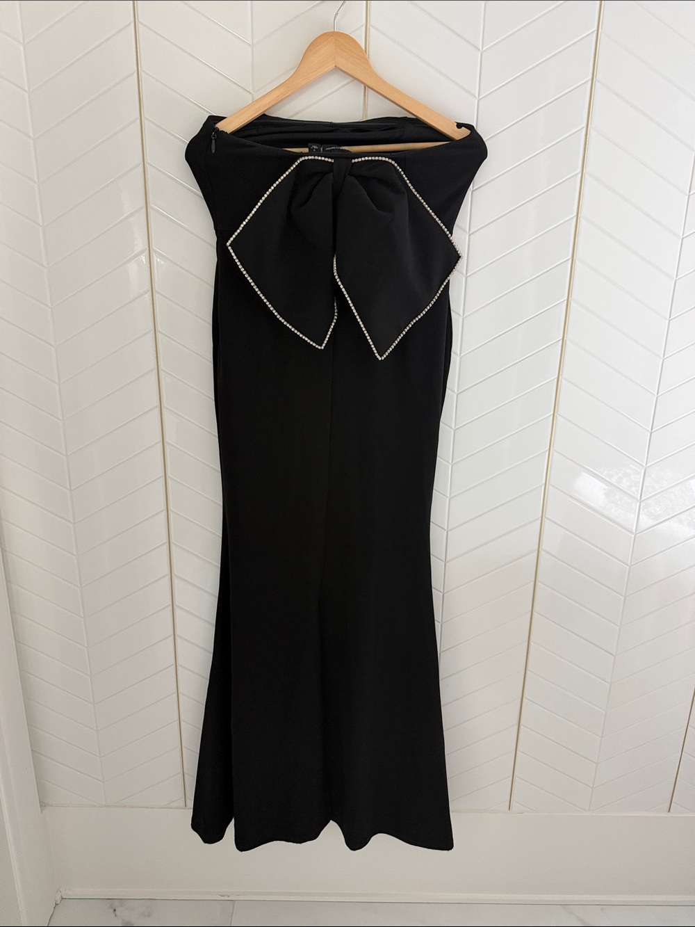 New York & Company Elegant Black Strapless Gown with Bow Accent